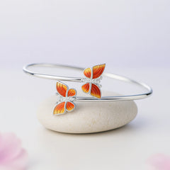 Rhodium Plated Silver Butterfly Bracelet with Orange Enamel & Sparkling CZ Stones
